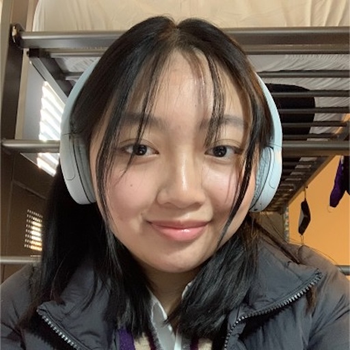 girl with black hair and headphones