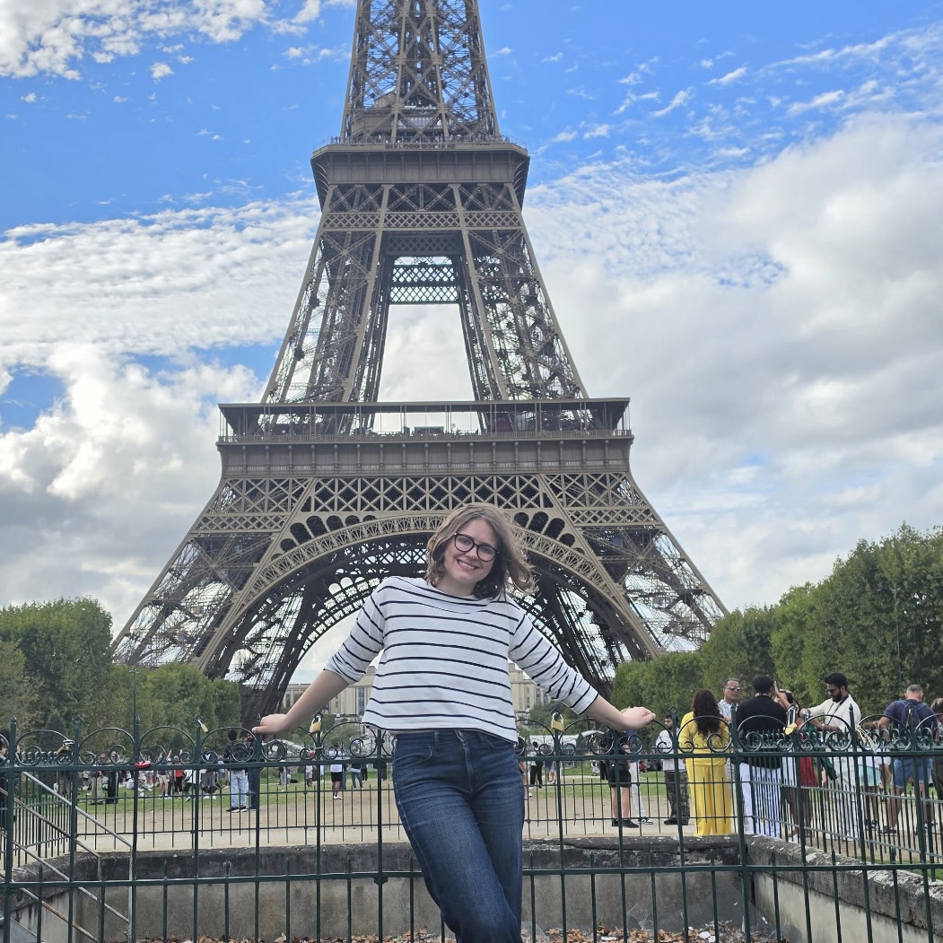 A picture of the Tamsyn in front of the Eiffel Tower in Paris, France.