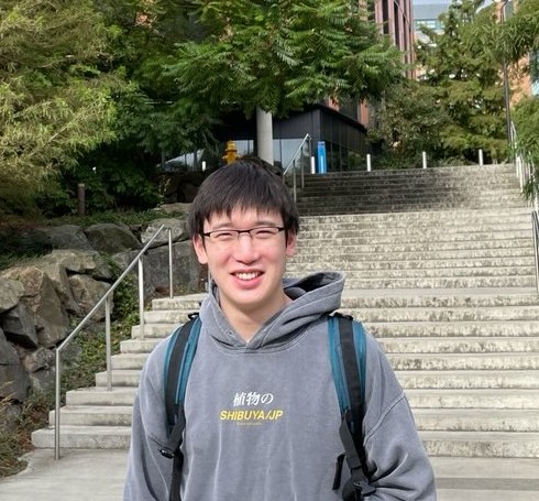 Personal photo smiling in front of the CS building.