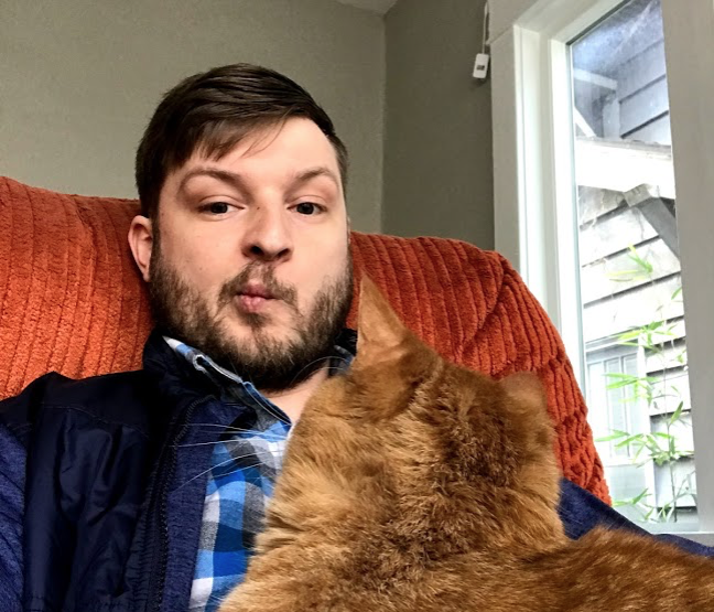 Fitz's face + one of two cats