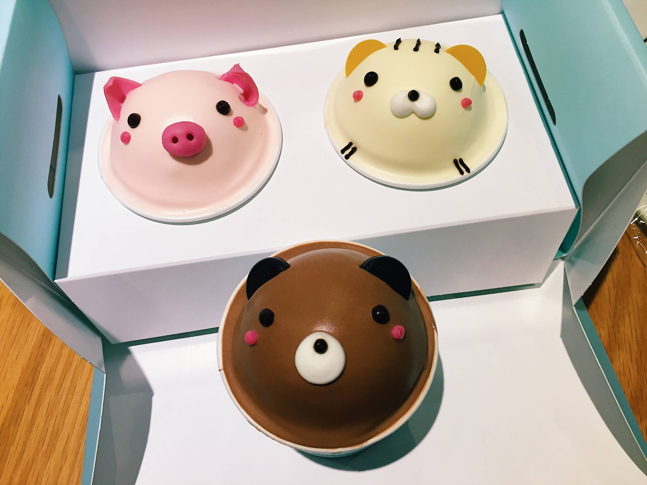 Cute little round cakes that are
              decorated to look like animals.