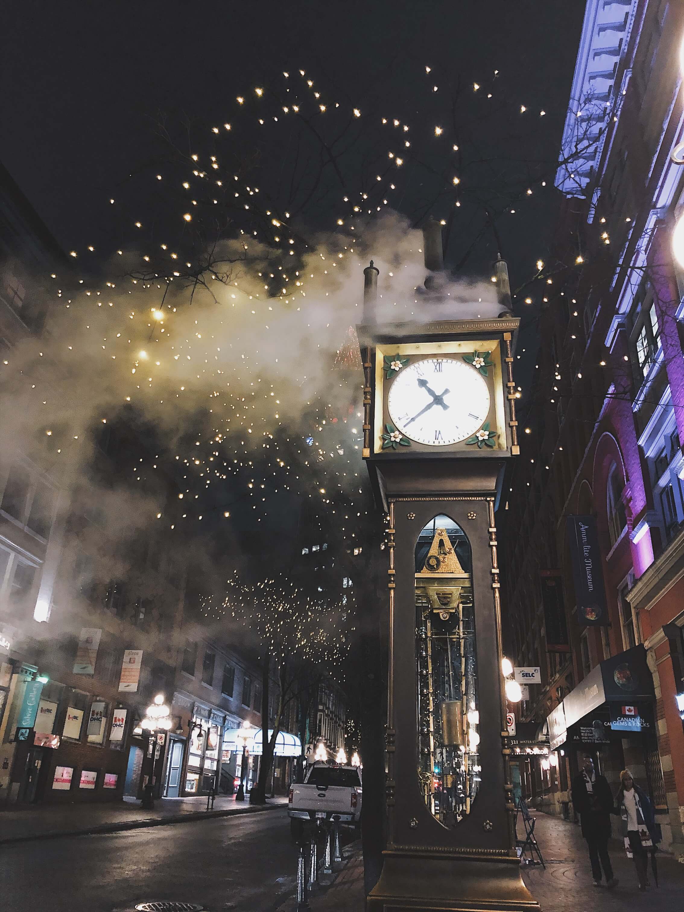 A clock with steam
              coming out of it.