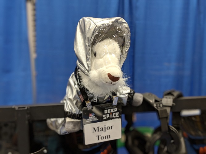 a happy stuffed goat named Major Tom