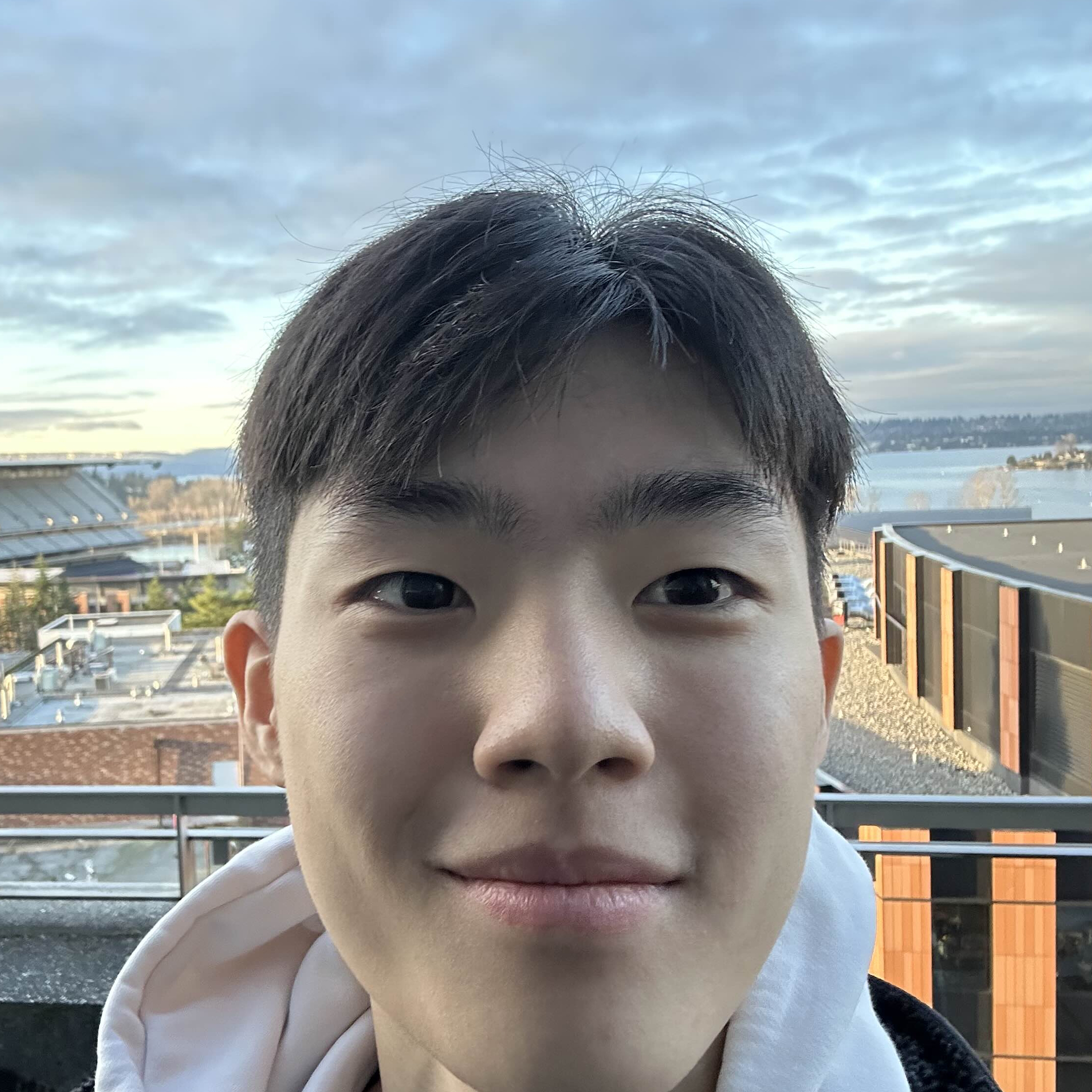 A profile picture of Jonathan Trinh.
    He is taking a selfie from the top floor of the Allen building