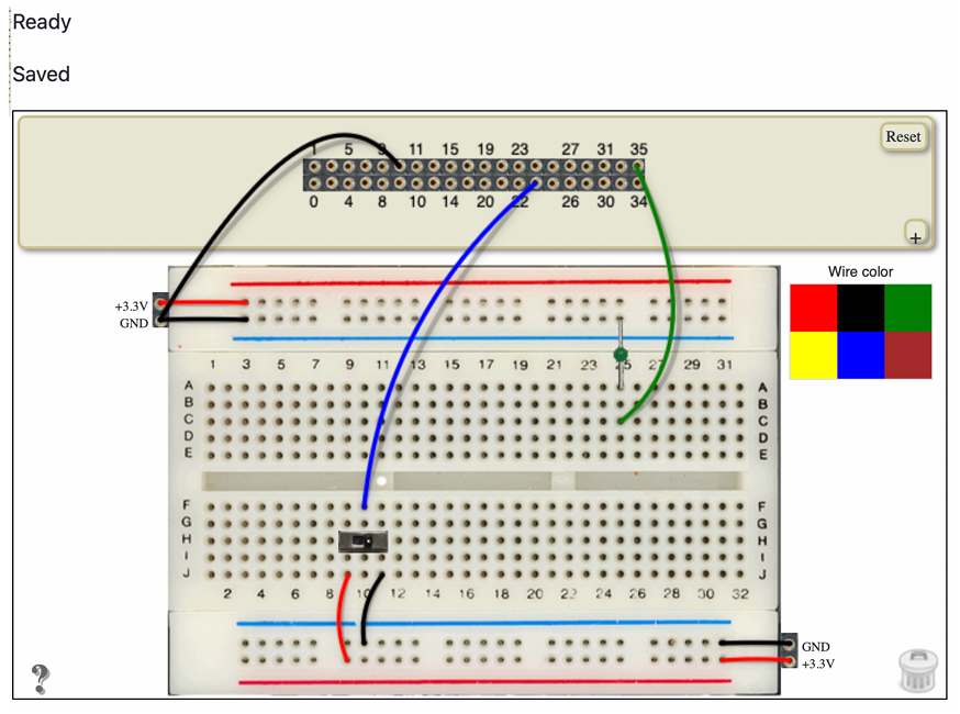 A breadboard with a switch and LED wired up according to the ports in the first snippet of code.