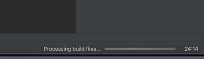 IntelliJ Gradle loading at the bottom-right