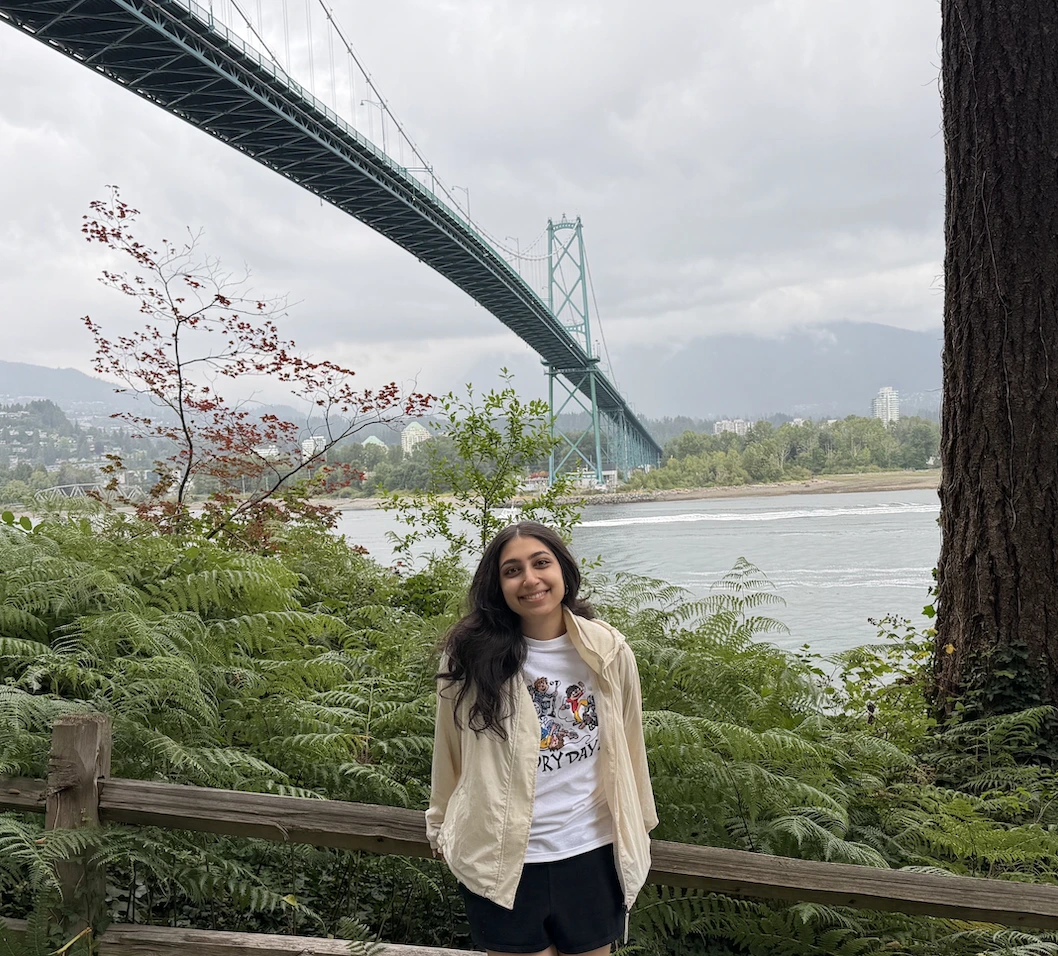 Aelysha Sharma smiling in a cafe