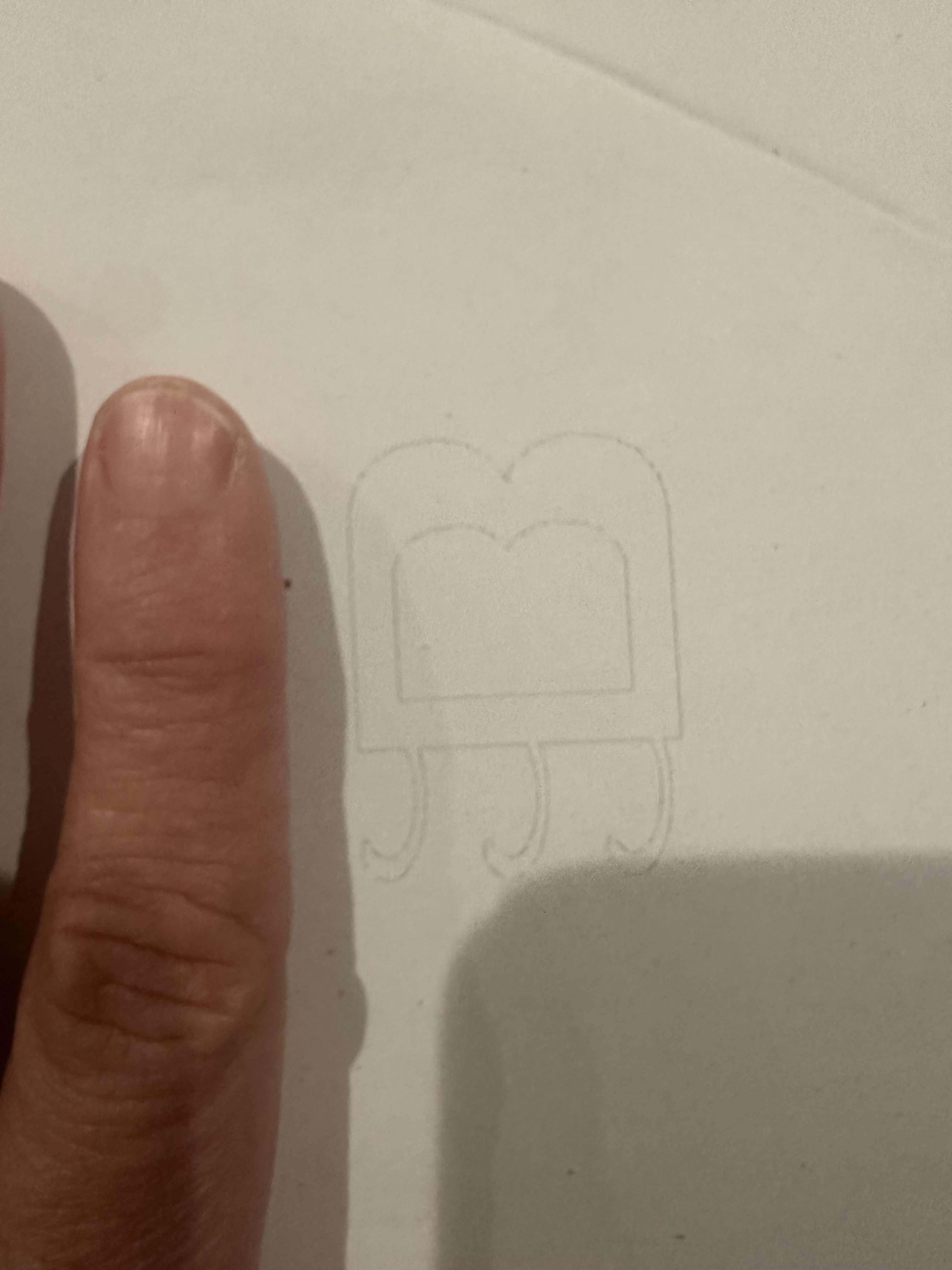 :img Initial design printed on paper is about the size of a single finger, 30%, width