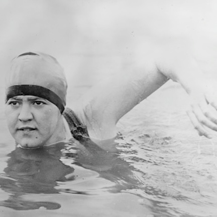 Gertrude Ederle caught mid-stroke while swimming