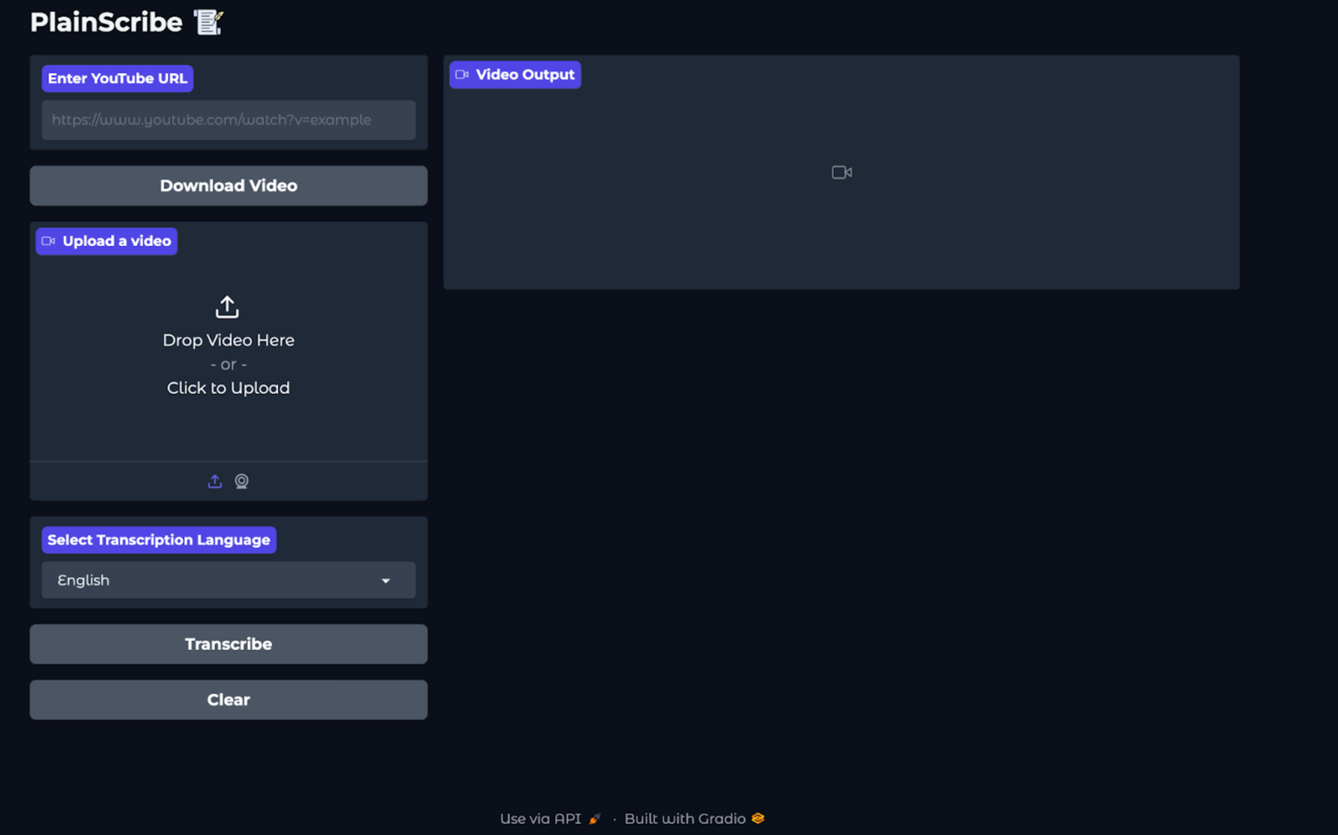 Screenshot of PlainScribe web app user interface. On the left side of the interface, there is a box for entering YouTube video URL with Download Video button below it. Below the YouTube downloader is a box for Uploading a Video, with a white arrow upload icon indicating the user to “Drop Video Here or Click to Upload”. Below this section is a dropdown menu for selecting transcription language. Below the dropdown is the Transcribe button followed by a Clear button. On the right side, there is an empty box with a film camera icon in the middle.