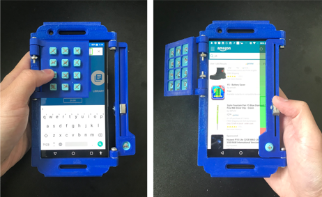 :img A picture of a mobile phone with a tangible scrollbar and number pad built into its case to help improve blind interaction with the phone,50%, width 