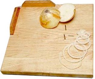 :img A cutting board with nails and ridges to make it easier for someone with lower hand dexterity to cut, 35%, width