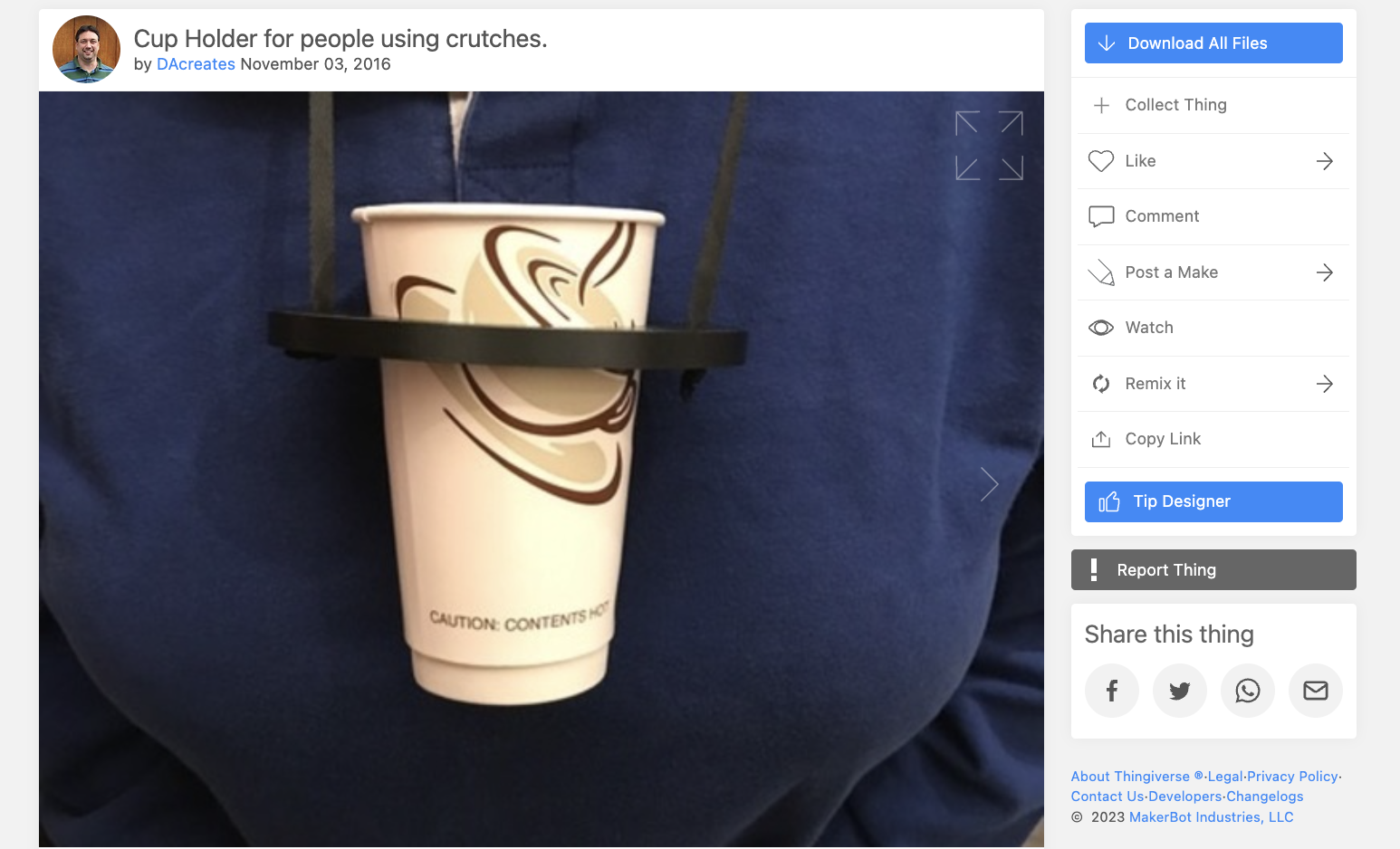 :img A ring that fits a cup with two holes to attach a string and hang it around ones neck, 50%, width