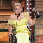 Picture of Ali Stroker; the first disabled woman to win a Tony Award; accepting her award