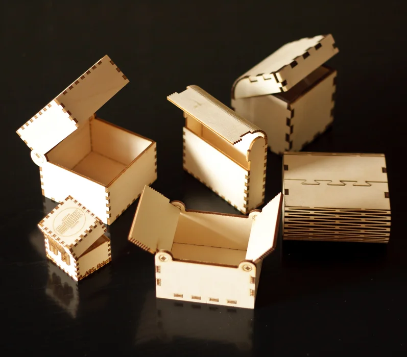 :img Pictures of laser cut boxes, 100%, width